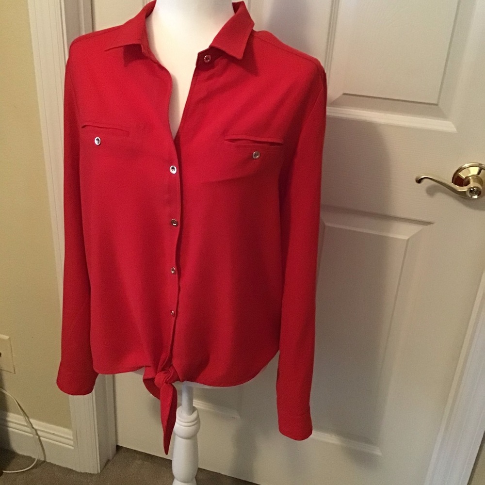 Alberto Makali red blouse with gold buttons.